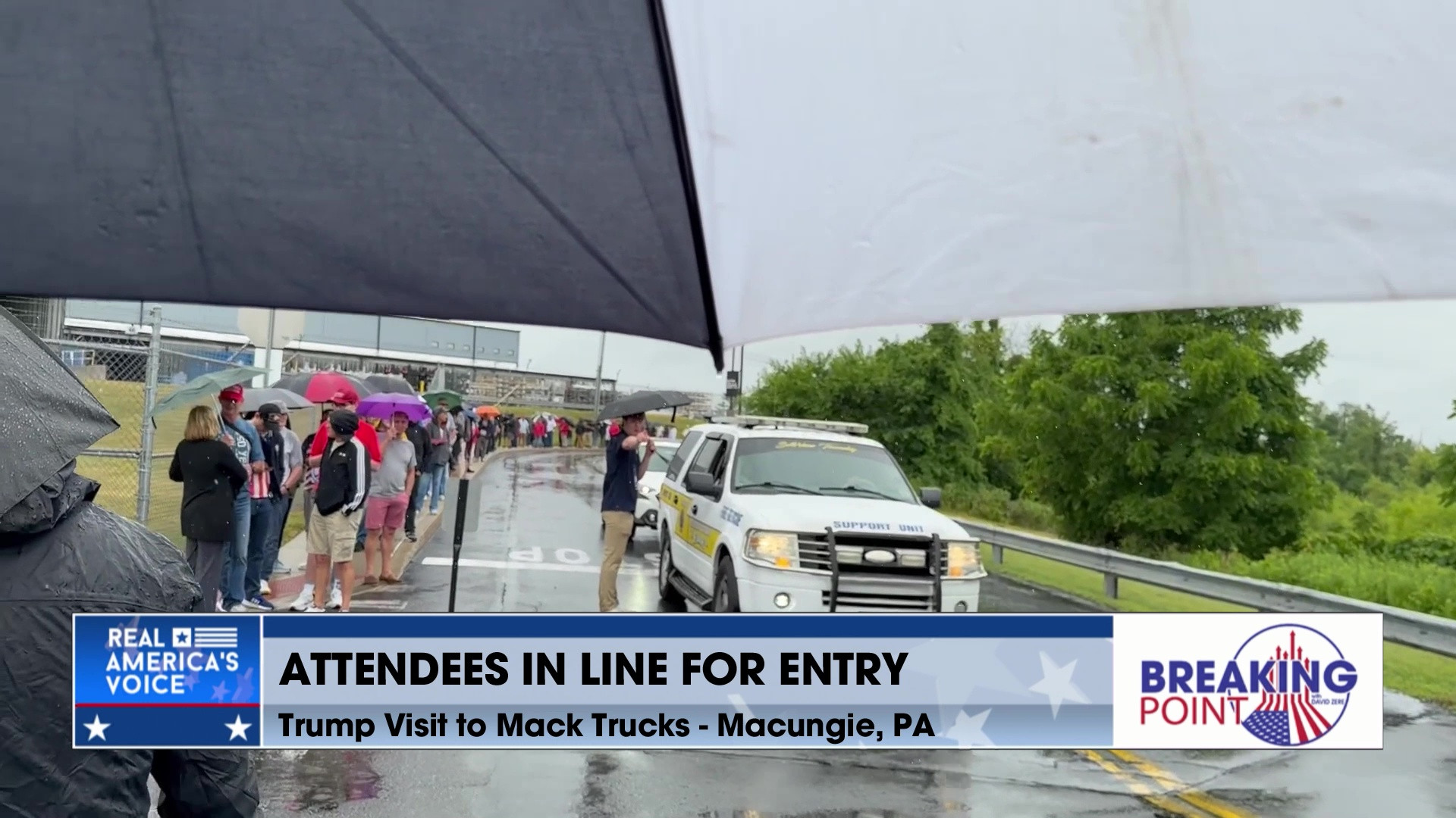 BP 6-27-26 C - David speaks with people waiting for Trump's remarks at Mack Trucks in Macungie, PA
