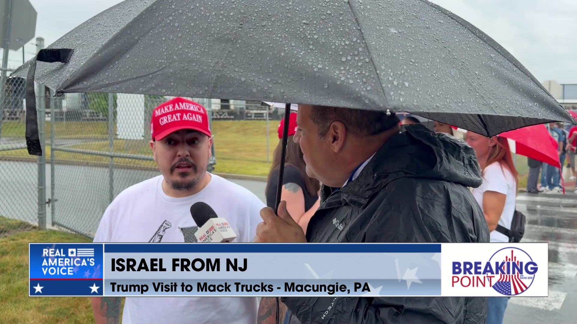 BP 6-27-26 B - David talks with people waiting for Trump's remarks at Mack Trucks in Macungie, PA