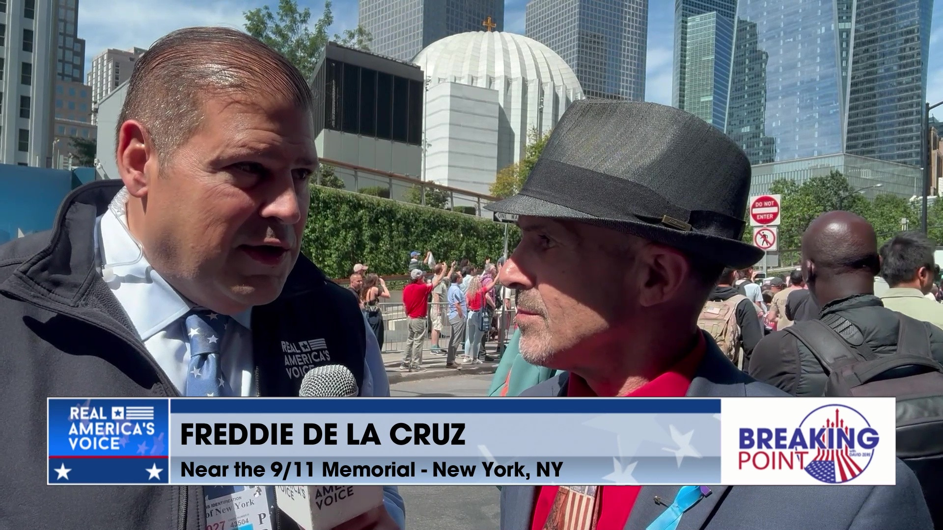 BP 9-20-25 C - David chats with visitors to the 9-11 memorial on the 24th anniversary